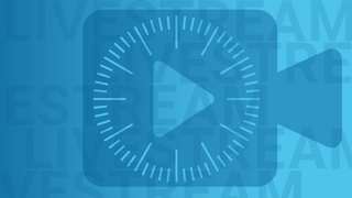 Zeichnung einer Videokamera mit "Play"-Button und einem Ziffernblatt als Symbolbild für einen Video-Livestream