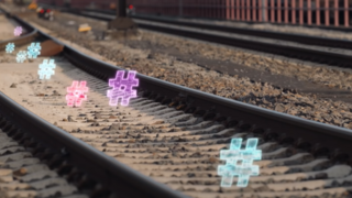 Bahnschiene mit digitalen Elementen